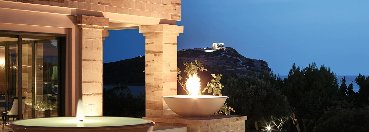 Stunning fire fountains and temple of poseidon view at Cape Sounio