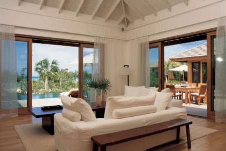 rocky point living room at como parrot cay resort caribbean