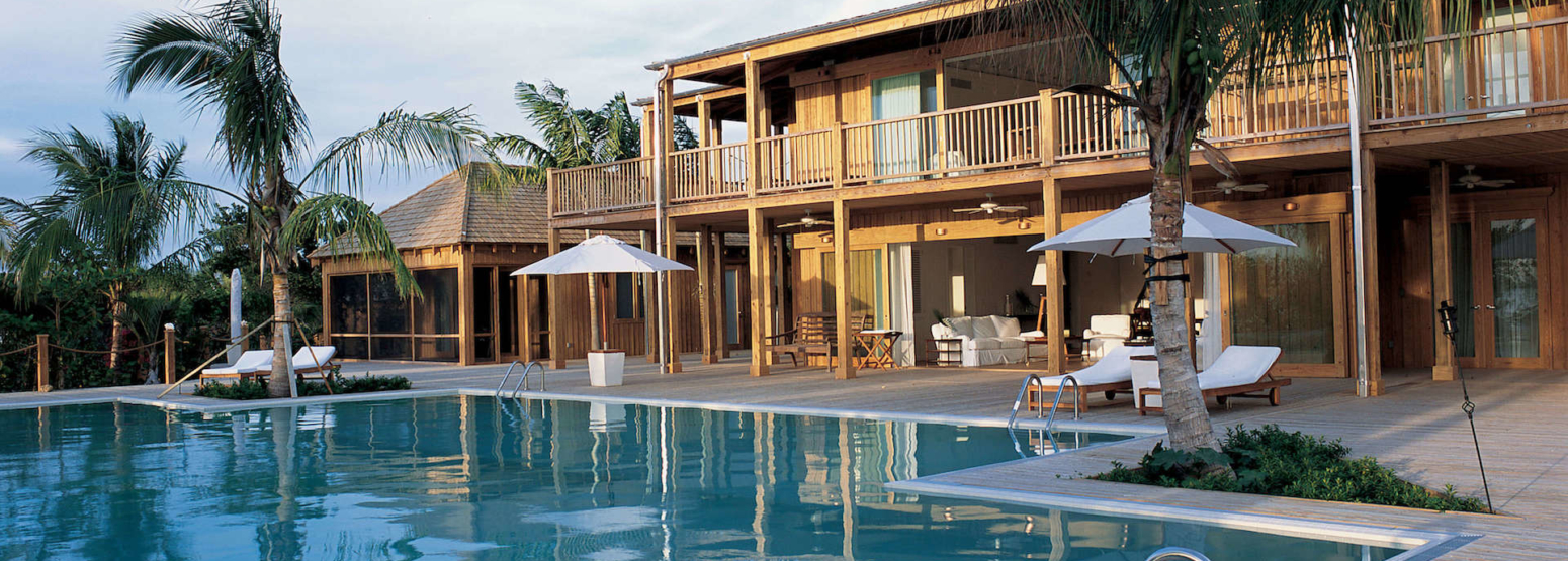 the residence exterior at como parrot cay resort caribbean