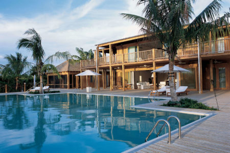 the residence exterior at como parrot cay resort caribbean