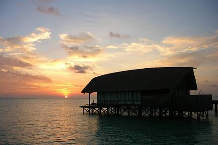 one bedroom villa as sunset at Cocoa Island by COMO Resort Maldives
