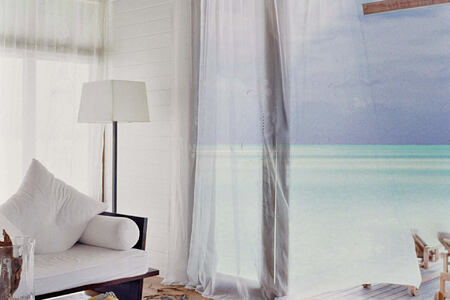 one bedroom villa lounge terrace at Cocoa Island by COMO Resort Maldives