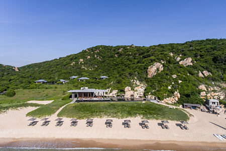 Aerial View to the Beach Club restaurant and private beach at amanoi luxury resort vietnam