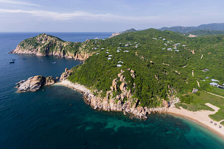 Aerial view of the property in the national park and look over the ocean and the bay at amanoi luxury resort vietnam