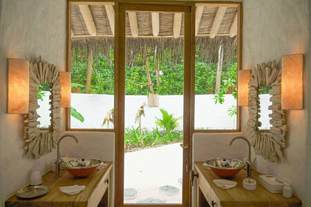 Crusoe Villa Suite 2 Bedroom with Pool (Villa 70) Master Bathroom at Soneva Fushi Beach Resort Maldives