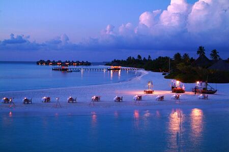 night beach at coco palm dhuni kolhu resort maldives