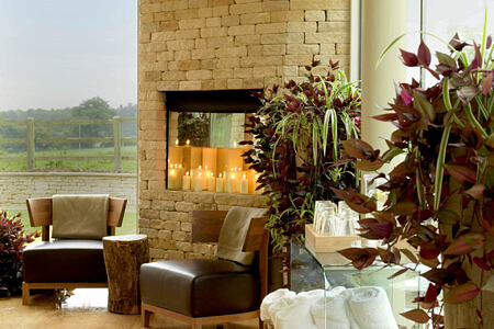Fireplace in Relaxation Room at The Garden Spa at barnsley house england uk
