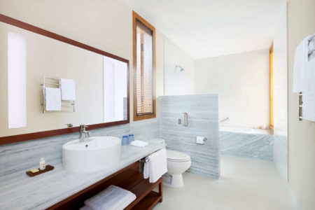 one bedroom villa bathroom at uma punakha hotel bhutan