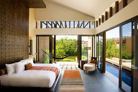 garden pool villa bedroom at banyan tree mayakoba resort mexico