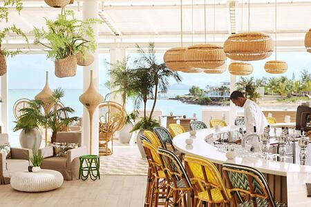 palm court bar at lux grand gaube resort mauritius
