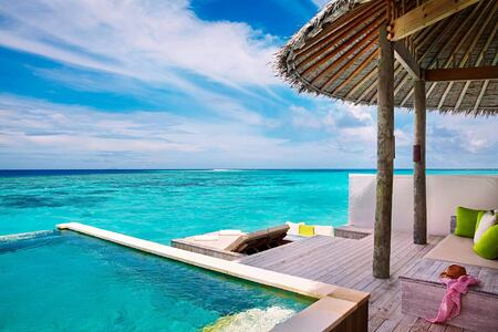 water villa with pool deck at six senses laamu hotel maldives