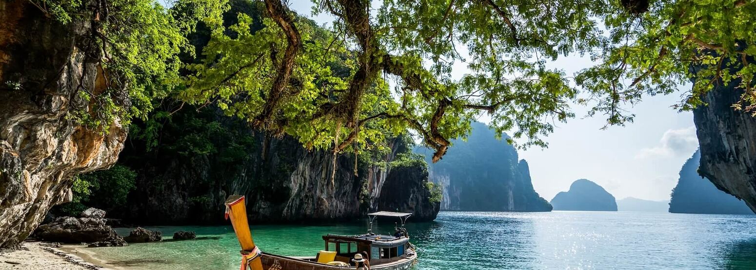 longtail boat island hopping at six senses yao noi resort phuket thailand