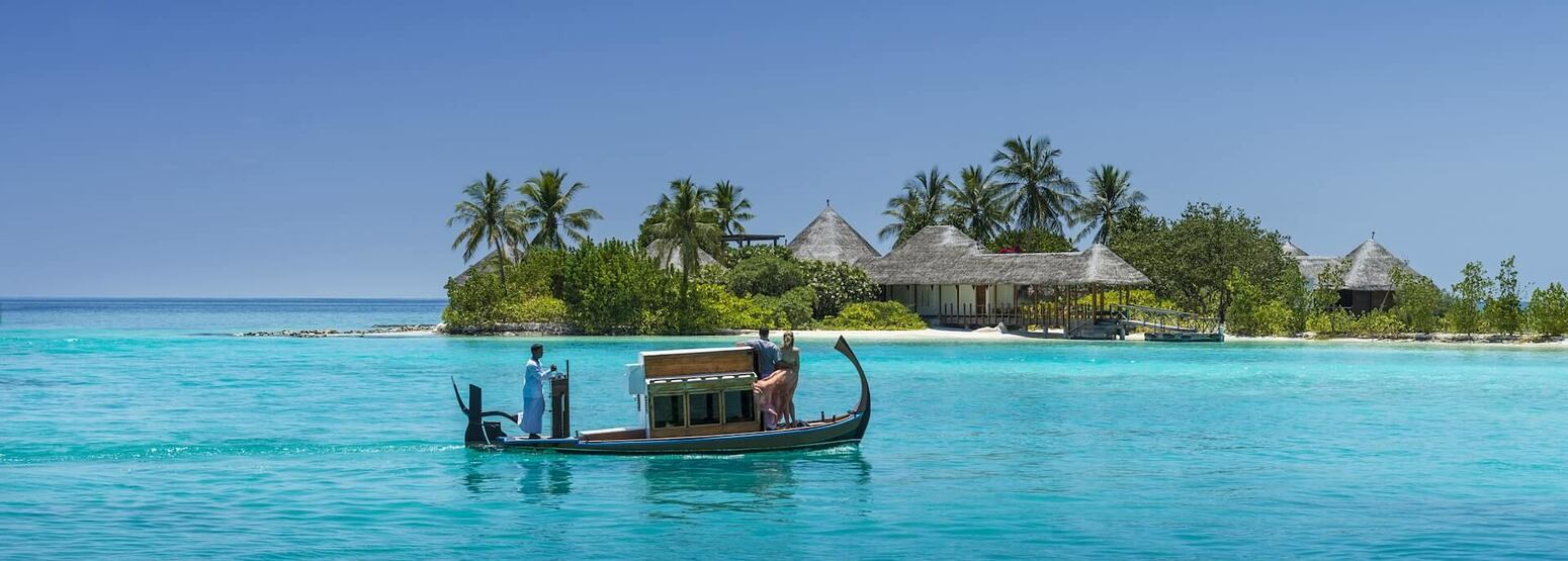 boat at four seasons kuda huraa resort maldives