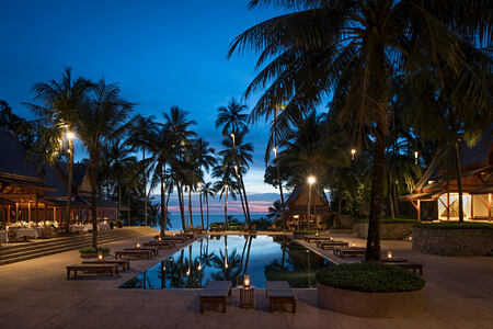 pool at night at amanpuri hotel phuket