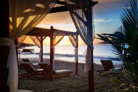 beach pergola sunset at ti kaye resort and spa jamaica