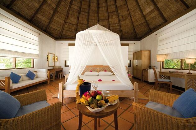 villa bedroom at coco palm dhuni kolhu resort maldives