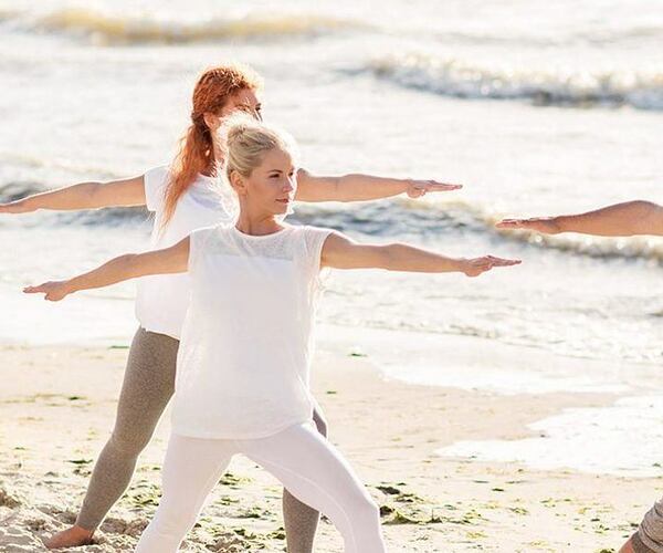 beach yoga at longevity vilamoura and medical spa algarve