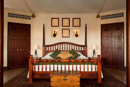 bedouin suite - custom size king bed at al maya desert resort dubai