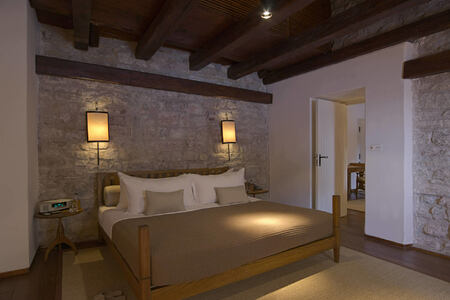 cottage bedroom at aman sveti stefan resort montenegro