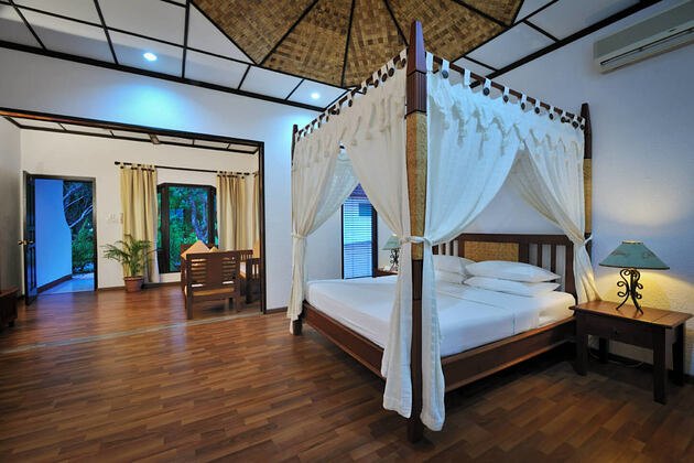 deluxe room interior at Bandos Island Resort Maldives