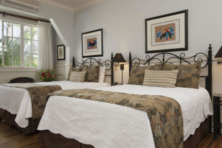 deluxe twin bedroom at hotel grano de oro costa rica