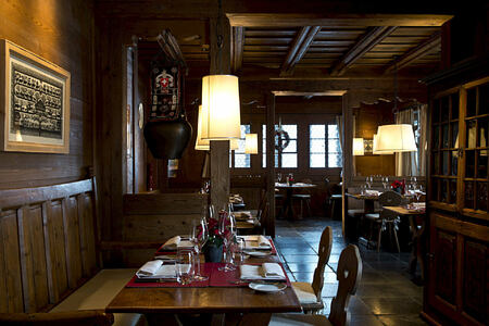 dining in the bar at alpina gstaad hotel switzerland