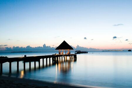 sunset at coco palm dhuni kolhu resort maldives