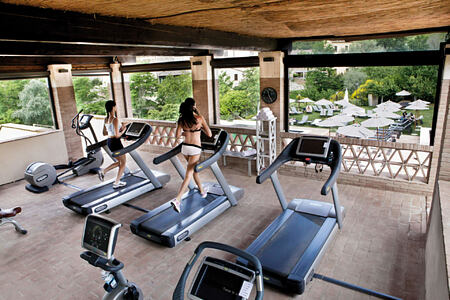 gym at Castel Monastero hotel