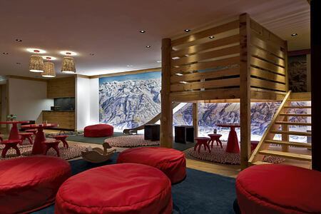 kids entertainment room at alpina gstaad hotel switzerland