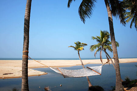 hammock on beach at Neeleshwar hotel