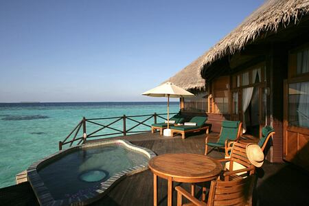 villa pool at coco palm dhuni kolhu resort maldives