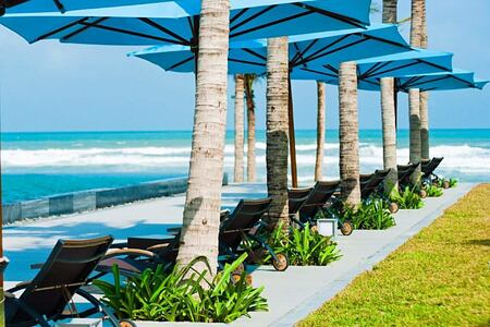 plenty of places to relax in the sunshine at fusion maia resort vietnam