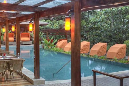 pool and dining terrace at nayara springs hotel costa rica