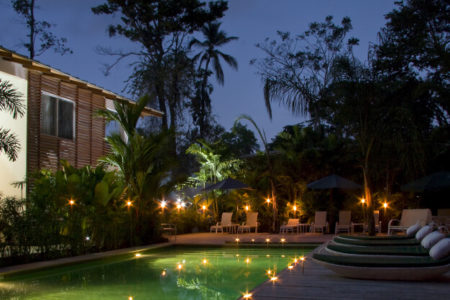 pool at night at le cameleon hotel costa rica