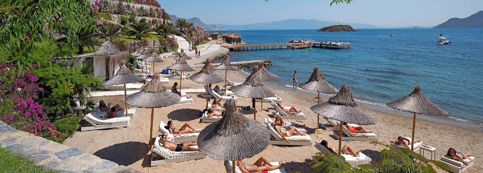 relax on the beach at sianji wellbeing resort turkey