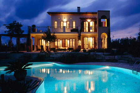 villa and pool at night at aphrodite hills hotel cyrpus