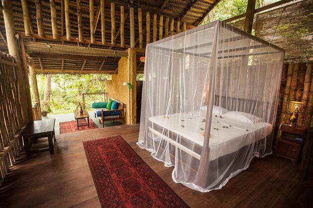 Bedroom in bamboo hut at Talalla Retreat Sri Lanka