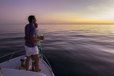 Couple enjoying a Sunset Cruise at Denis Private Island Seychelles