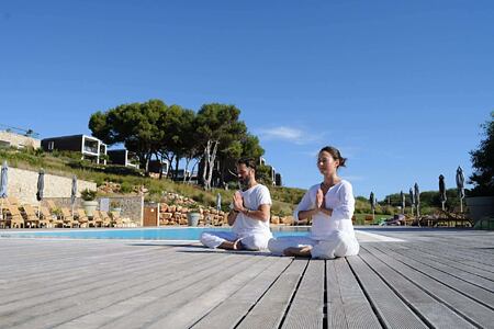 Enjoying Yoga outside at Martinhal Resort, Portugal