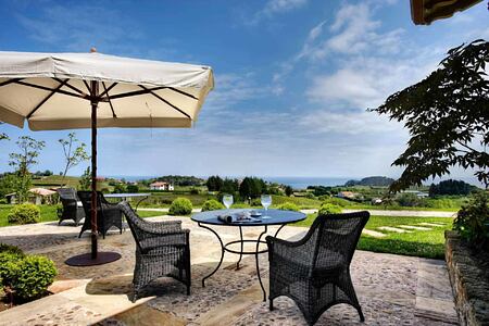 Terrace with coastal views at Hotel Iturregi