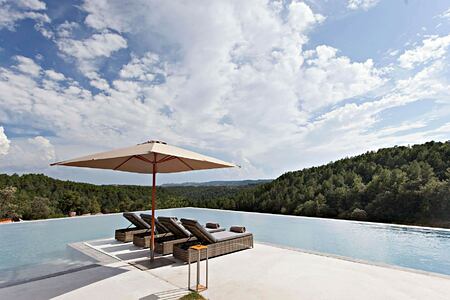 Stunning views across the forest from the pool at la Vella Farga Spain