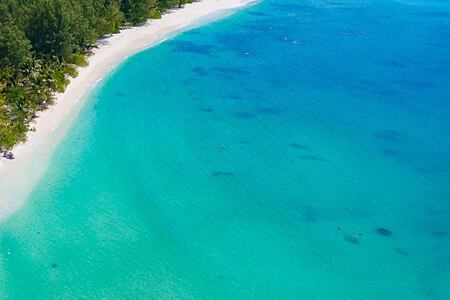 Aerial coastal view of Denis Private Island Seychelles