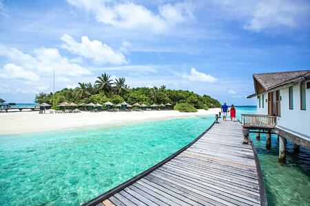 jetty and villa at reethi beach resort maldives