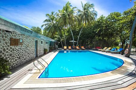 swimming pool at reethi beach resort maldives