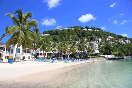 Beach hotel and hills at Windjammer Landing St Lucia