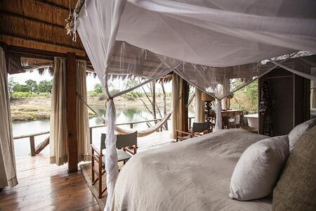 Bedroom view over Zambezi at Sindabezi Island Zambia