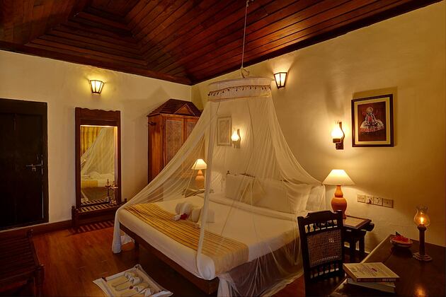 Bedroom with nets at Somatheeram Kerala India