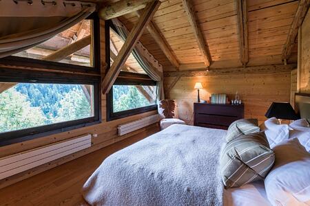 Bedroom with views at Ferme de Moudon France