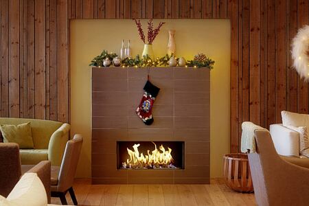Christmas stocking over fireplace at Icelandair Hotel Iceland