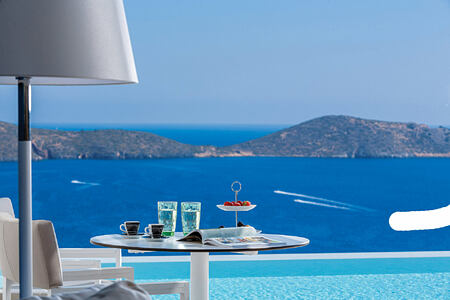 Island view from Superior Suite private pool at Elounda Gulf Villas and Suites Crete